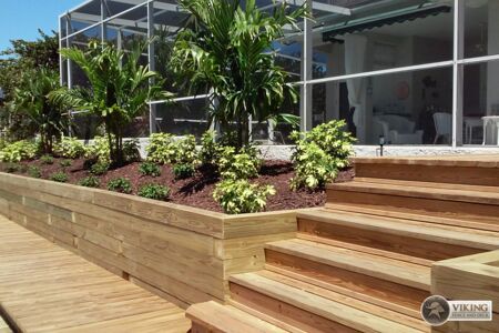 Retaining wall with deck and staircase